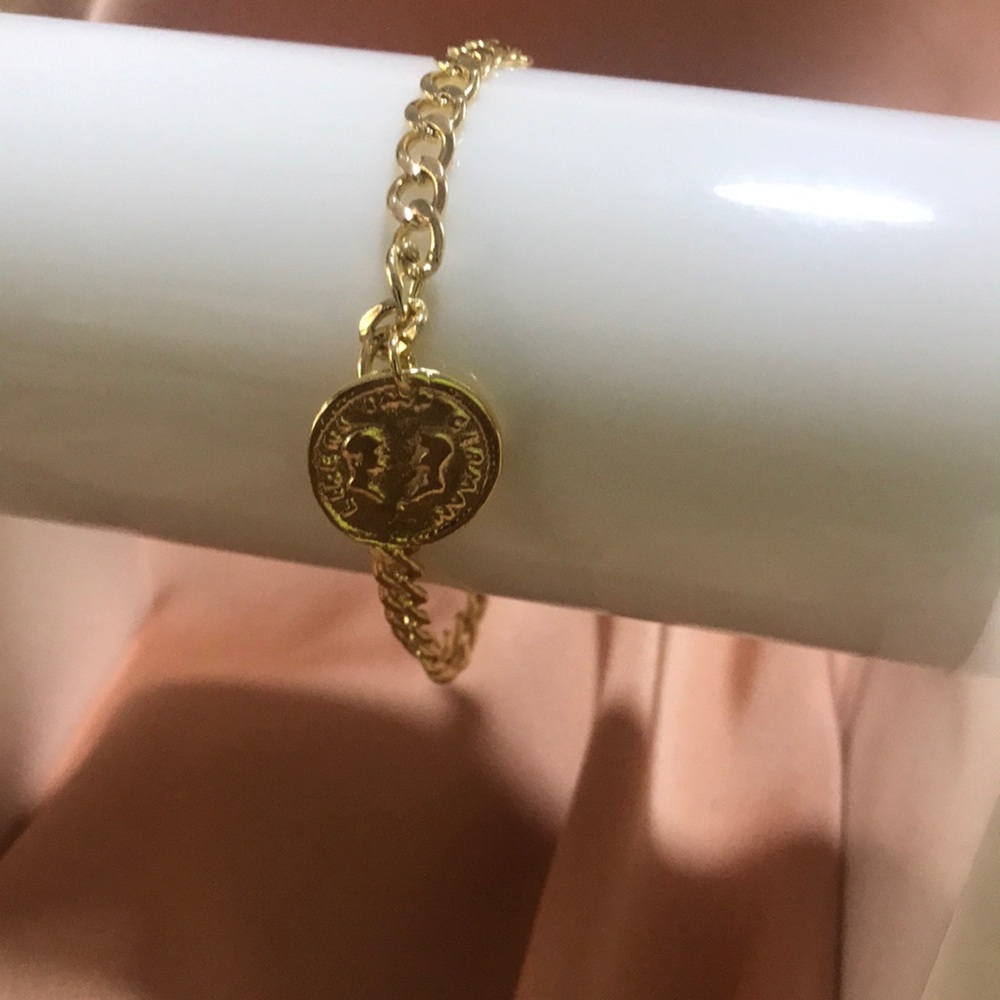14k gold plated charm bracelet. Will never tarnish. Hand made, high quality.